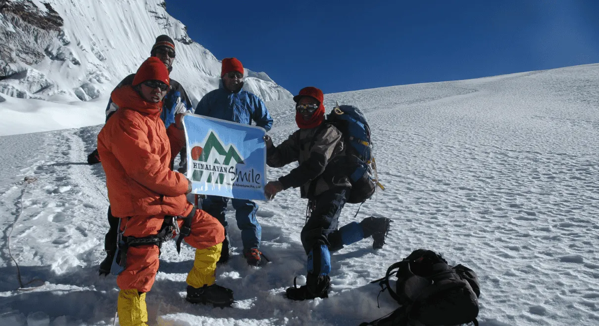 Nepal trekking porter carrying backpack in mountain trail