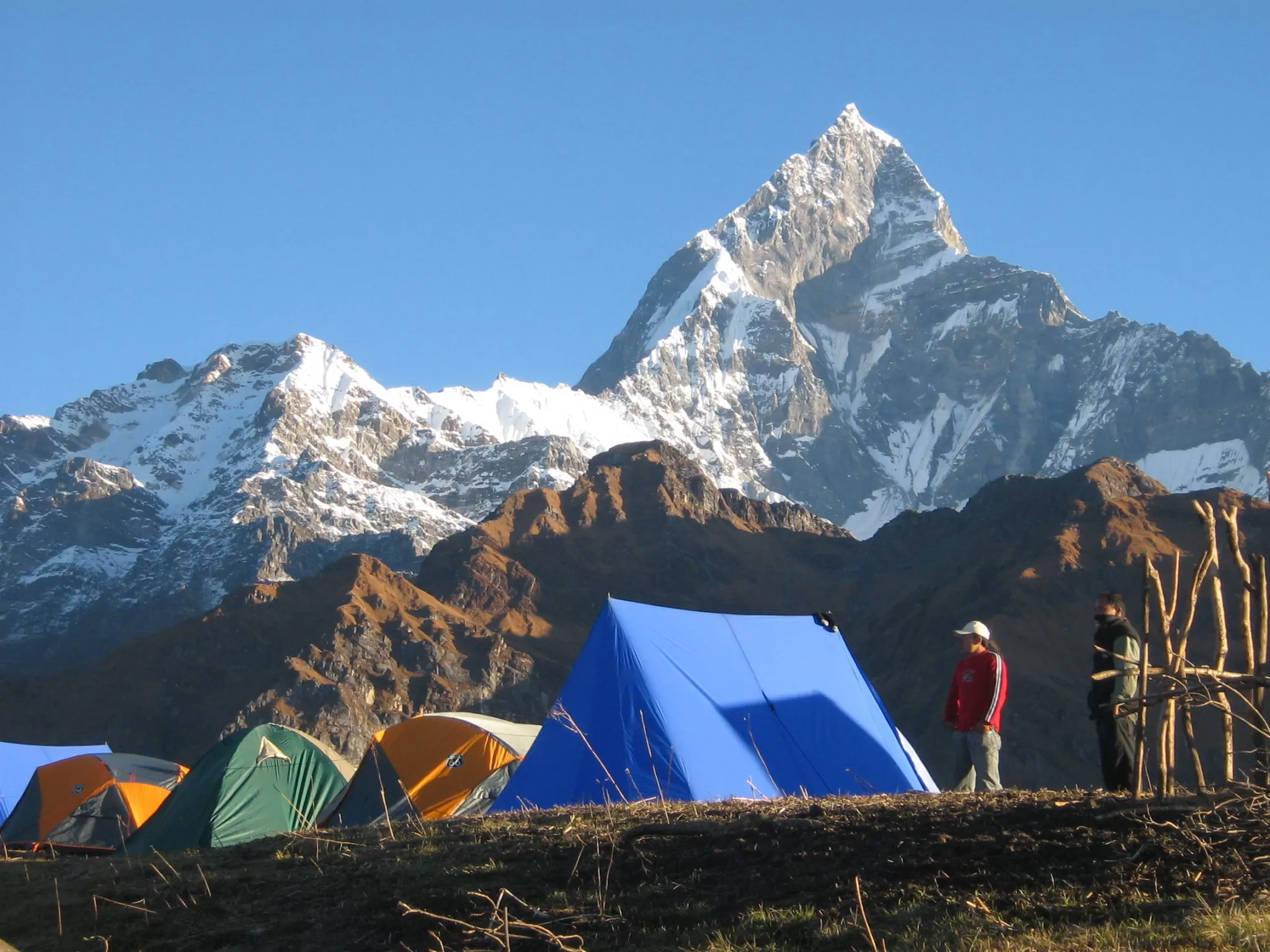 Trekkers viewing Machapuchhare sacred mountain in Nepal
