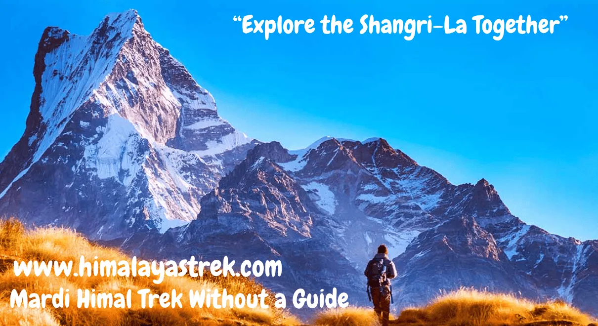 Trekker standing at Mardi Himal Base Camp with Machhapuchhre Himal in background