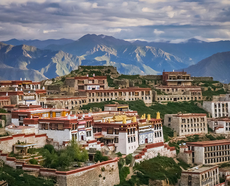 Move to Lhasa by train. Sightseeing tour of Sera Monastery, Jokhang Temple and Barkhor market. Overnight at hotel in Lhasa.'