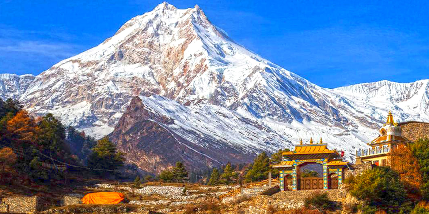 Trek to Shinjungma (3620m) across the Nyalu La Pass (4940m).'