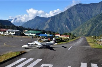 Fly to Lukla. Trek to Phakding.'