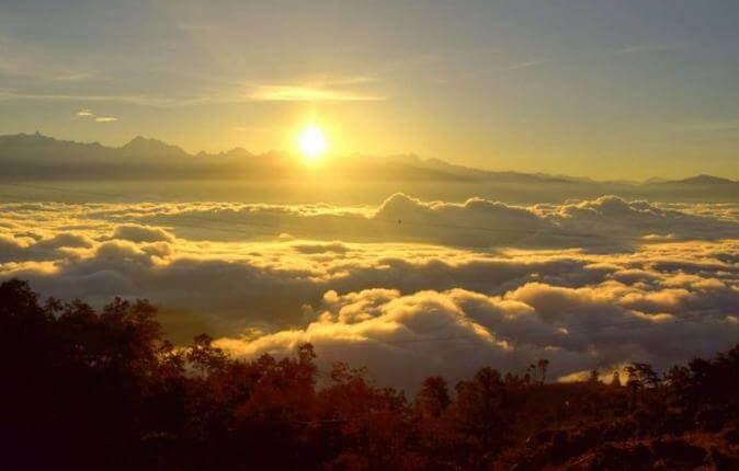 Enjoy sun rise above high mountains