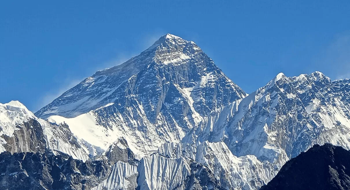 Family adventure holiday in Mount Everest region with kids enjoying Himalayan mountain views