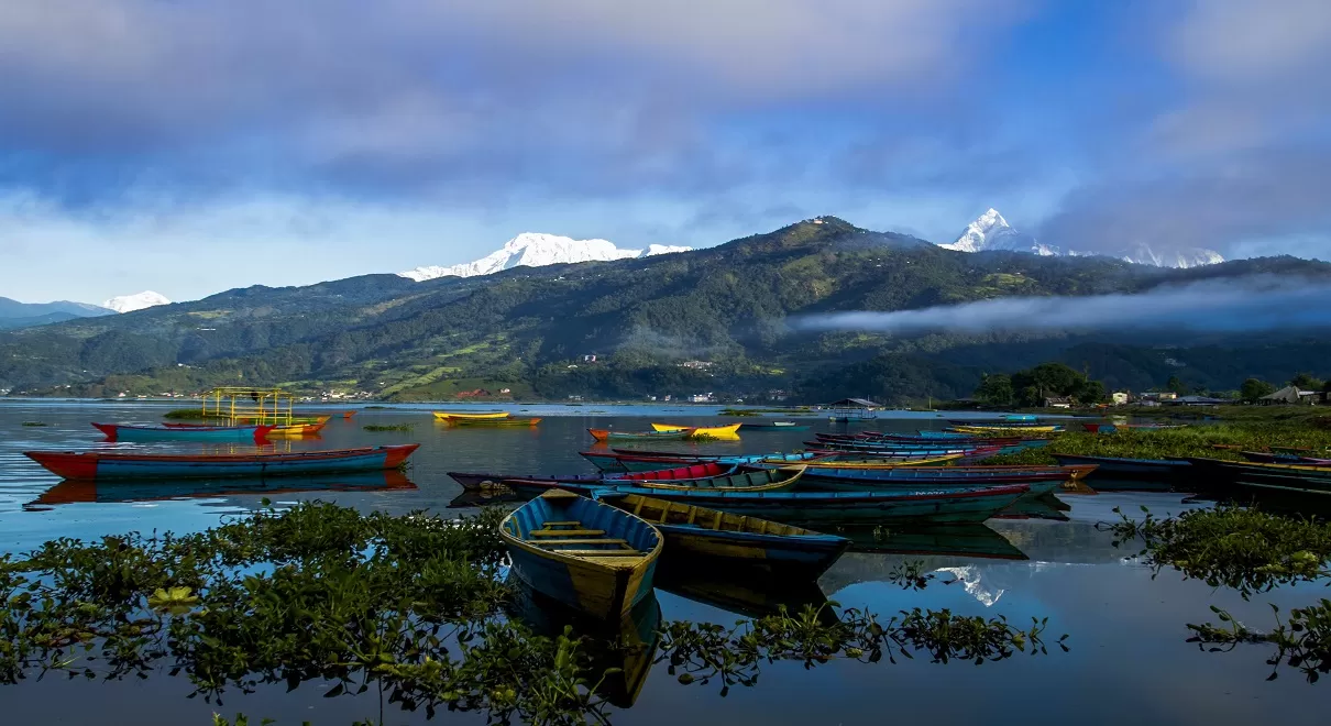 Meditation session during Nepal retreat tour with Himalayan mountain backdrop