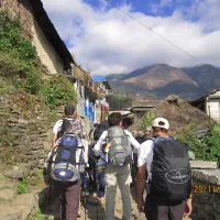 Travel to Nayapul (1,070m) by car (1,500m), walk to Ulleri (2,070m) 