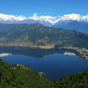 Trek to Phedi (1,130m) via Dhampus. Drive to Pokhara.